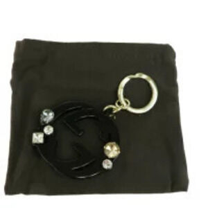 Gucci bag charm key chain interlocking rhinestones black gold